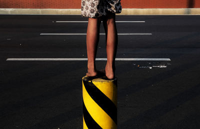 Low section of woman standing on floor
