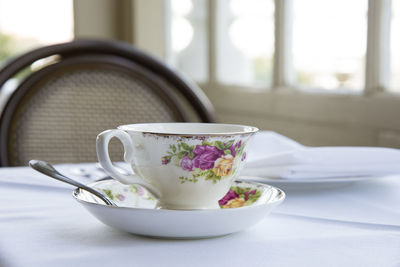 Close-up of tea cup on table