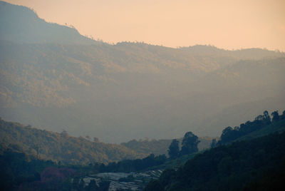Scenic view of mountains against sky during sunset