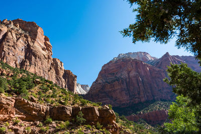 Scenic view of rocky mountains against clear sky