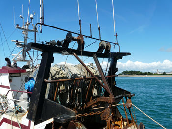Low angle view of boat on sea against sky