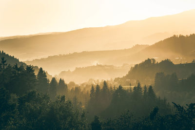 Scenic view of mountains against sky during sunset