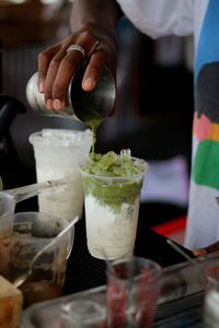 Midsection of man preparing food