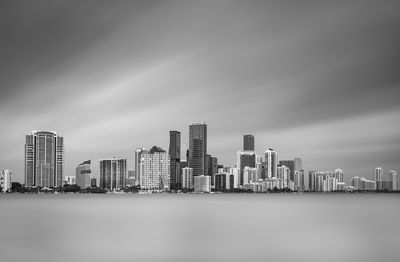 Modern buildings in city against sky