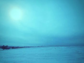 Close-up of frozen sea against sky