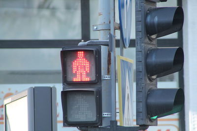 Red illuminated pedestrian sign