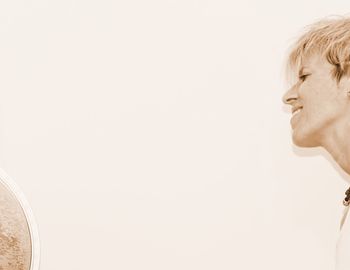 Portrait of boy against white background