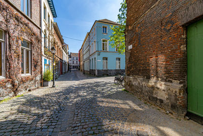 View of alley along buildings