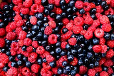 Full frame shot of blueberries and raspberries