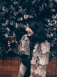 Young woman drinking beer glass