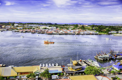 High angle view of boats moored at harbor