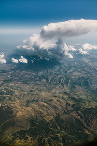 Aerial view of cityscape against sky