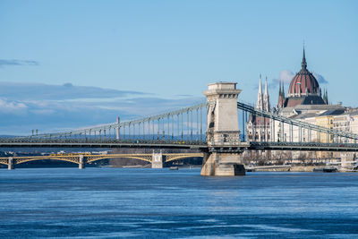 View of bridge over river against sky