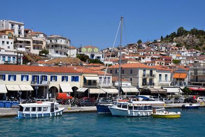 Boats moored at harbor