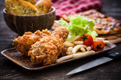 Close-up of burger in plate on table