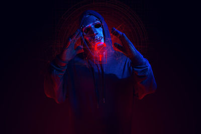 Digital composite image of man wearing mask