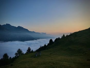 Scenic view of landscape against sky during sunset