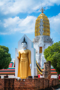 Low angle view of statue against sky