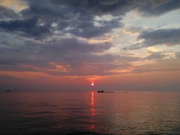 Scenic view of sea at sunset