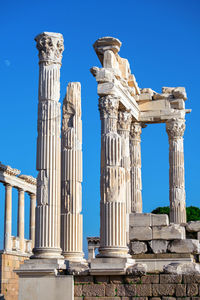 Low angle view of old ruins against clear sky