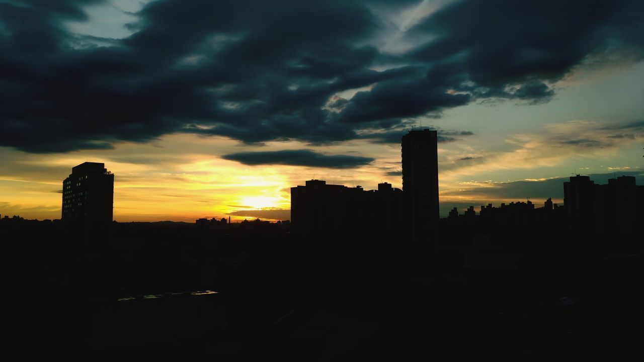 SILHOUETTE OF CITY DURING SUNSET