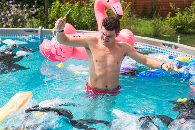 Man swimming in pool