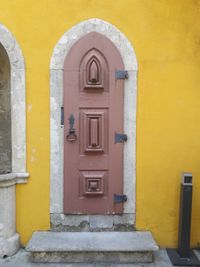 Close-up of yellow door