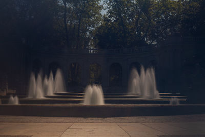 View of fountain against trees