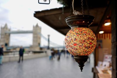 Illuminated lanterns hanging in city