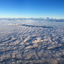 Scenic view of cloudscape against clear blue sky