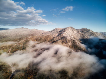 Scenic view of volcanic mountain against sky