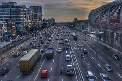 High angle view of traffic on road at sunset