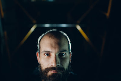 Close-up portrait of bearded man