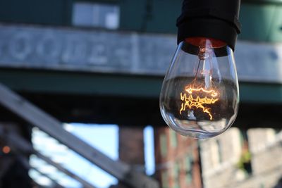 Close-up of illuminated light bulb