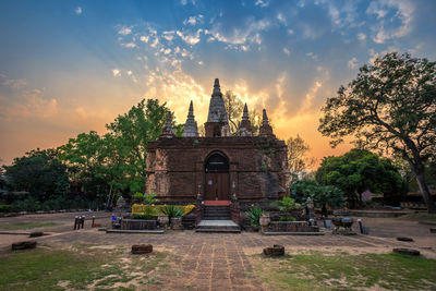 Group of people in temple against building