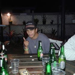 Young man sitting at table