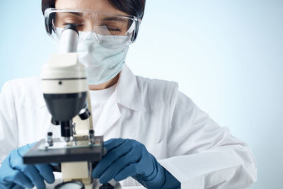 Scientist examining chemical in laboratory