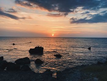 Scenic view of sea during sunset