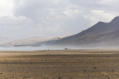 Scenic view of desert against sky