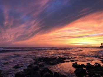 Scenic view of sea against sky during sunset