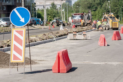 Road sign on street in city