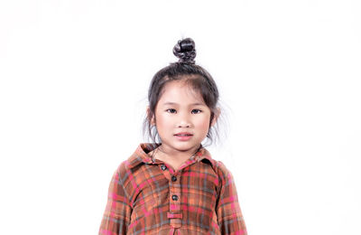 Portrait of a boy against white background