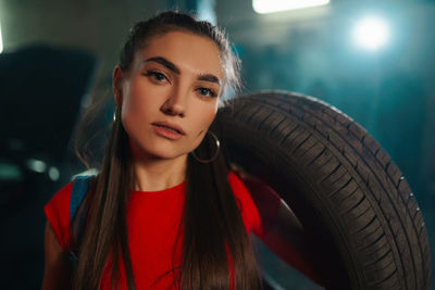 Portrait of a beautiful young woman in car