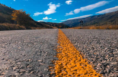 Surface level of road against sky