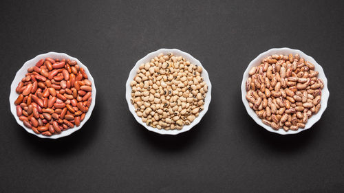 High angle view of eggs on table against black background