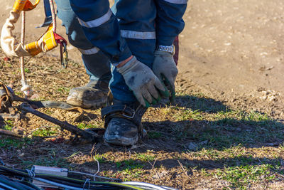 Low section of man working