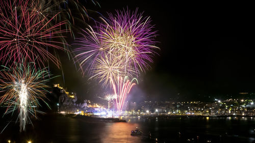 Firework display at night
