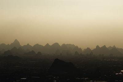 Scenic view of mountain against sky during sunset