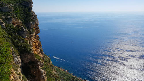 High angle view of sea against blue sky