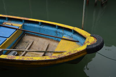 High angle view of old boat moored in lake